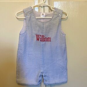 Boys blue seersucker John John with red embroidered “William” 6m